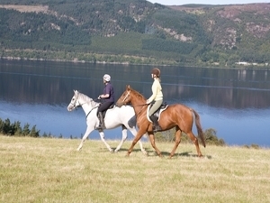Enjoying the views of Loch Ness on horseback